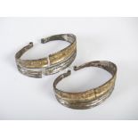 Two Chinese white metal bracelets, possibly Tang, 7cm wide.
