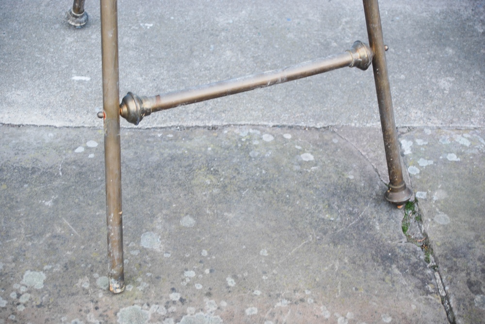 An early 20th century brass easel, 149cm high x 59cm wide. - Image 2 of 4