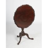 A George III style mahogany snap top occasional table, the hinged top with a pie crust edge,
