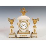 A late 19th century French marble and ormolu mounted clock garniture, the clock with a circular