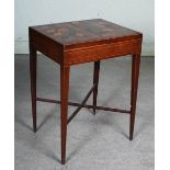 A 19th century rosewood and boxwood lined games table, the rectangular top with two hinged covers
