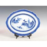 A Chinese porcelain blue and white oval shaped serving dish, Qing Dynasty, decorated with