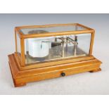 An oak and brass barograph, NEGRETTI & ZAMBRA, LONDON, R/20627, in bevelled glass case, 42.5cm