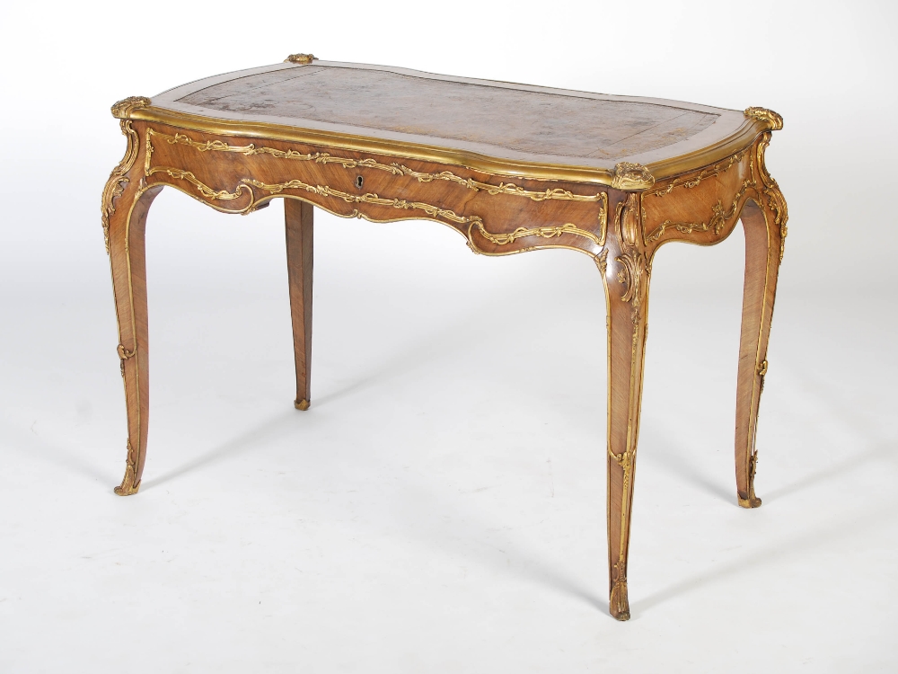 A late 19th century Continental kingwood and gilt metal mounted bureau plat in the Louis XV style,