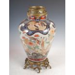 An ormolu mounted Japanese Imari Jar, Edo Period, decorated with peony, chrysanthemum and birds, the