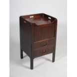 A George III mahogany tray top commode, the rectangular top with pierced three quarter gallery above
