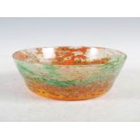 A Monart bowl, shaped JC, mottled orange, yellow, green and clear glass, with gold coloured