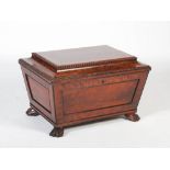 A 19th century mahogany and ebony lined sarcophagus shaped wine cooler, the hinged cover opening