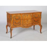 A French Louis XVI style marquetry and gilt metal mounted commode, the altered hinged top opening to
