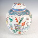 A Chinese porcelain famille rose jar and cover, Qing Dynasty, decorated with precious objects within