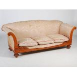A William IV mahogany sofa, the upholstered back and arms above a rectangular seat with loose