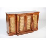 A 19th century Regency rosewood breakfront chiffonier, the rectangular top above a pair of