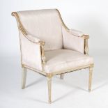 An Empire style gilded and painted wood armchair, the scroll over satin upholstered back, arms and
