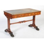 A 19th century rosewood and gilt metal mounted Regency style library table, the rounded