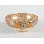 A Japanese Satsuma pottery butterfly bowl, Meiji Period, the interior decorated throughout with a