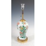 A gilt metal mounted Chinese porcelain famille verte jar converted to a table lamp, Qing Dynasty,