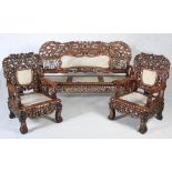 A Chinese dark wood, marble and mother of pearl inlaid hall settle and pair of corresponding