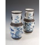 A pair of Chinese porcelain blue and white crackle glazed vases, decorated with peony and bird