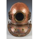 An early 20th century copper and brass twelve bolt divers helmet and collar, diameter at base of
