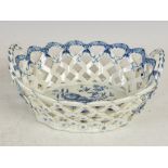 An 18th century Worcester blue and white porcelain twin handled basket, the interior decorated
