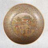 A Japanese Satsuma pottery bowl, Meiji Period, the interior decorated with a circular panel