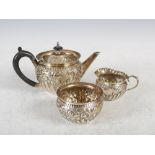 A late Victorian silver three piece bachelor's tea set, Sheffield, 1895, makers mark of Walker &