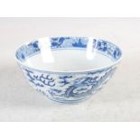A Chinese porcelain blue and white dragon bowl, decorated on exterior with two dragons and cloud