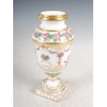 A late 19th/early 20th century Continental porcelain urn, decorated in the Neo Classical style