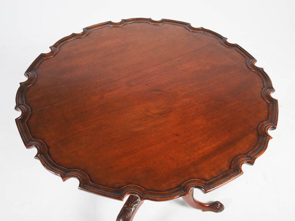 A George III mahogany occasional table, the hinged circular top with a pie-crust edge raised on a - Image 3 of 5