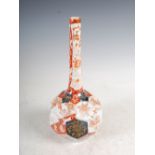 A Japanese Imari bottle vase, late 19th/early 20th century, decorated with hexagonal shaped panels