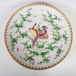 A Samson porcelain charger, decorated with pair of colourful birds, 45.5cm diameter.