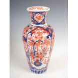 A Japanese Imari vase, late 19th/early 20th century, decorated with shaped rectangular panels of