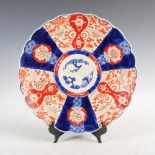 A Japanese Imari charger, late 19th/early 20th century, decorated with a central roundel enclosing