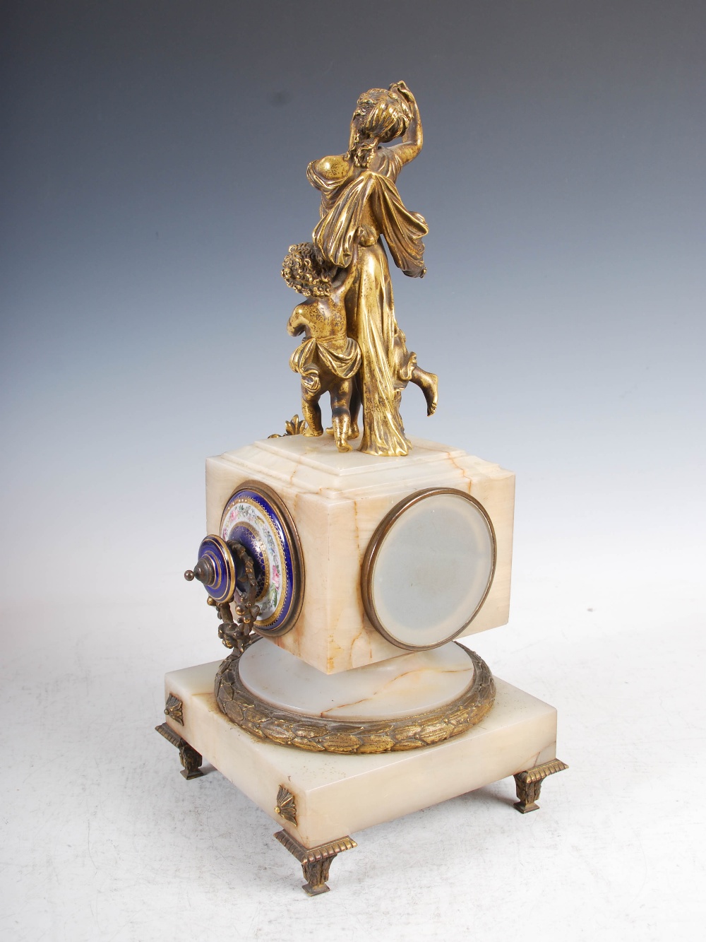 A late 19th century French onyx ormolu and porcelain mounted mantel clock, the blue ground porcelain - Image 6 of 7