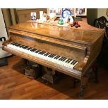 A walnut cased boudoir grand piano, Hagspiel & Comp. Dresden, raised on tapered octagonal supports