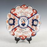 A Japanese Imari charger, late 19th/early 20th century, decorated with a central roundel enclosing