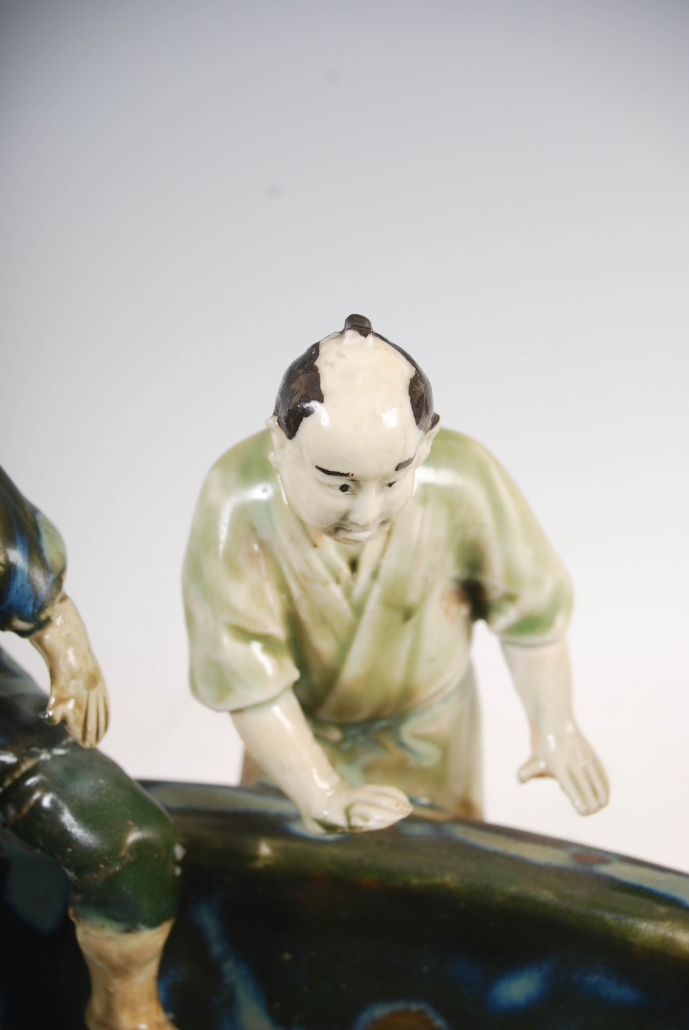 A Japanese ceramic fish bowl, early 20th century, modelled with ten figures around the rim, - Image 4 of 15