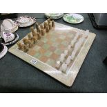 Stone (possibly Onyx) chess board and set of pieces