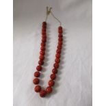 Carved coral necklace with 9ct gold clasp