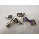 4 pairs of stone set silver earrings