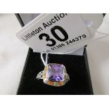 Silver ring set with large amethyst