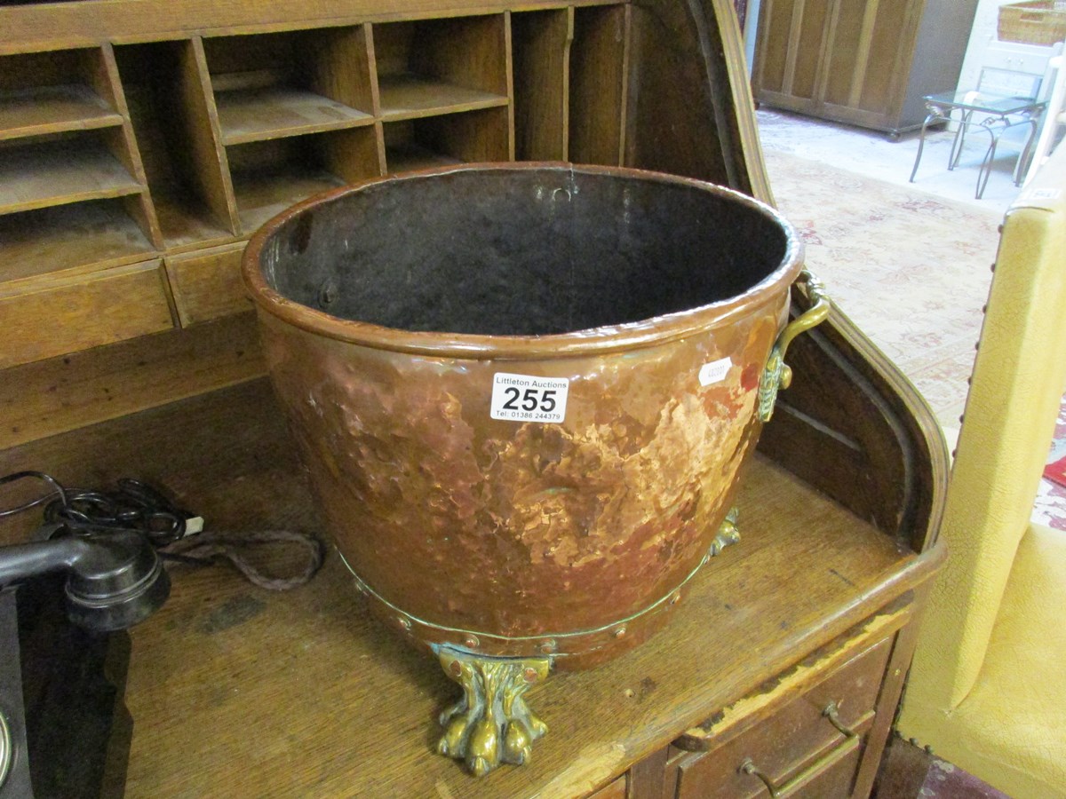 Large copper coal bucket on claw feet