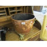 Large copper coal bucket on claw feet