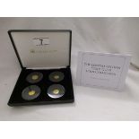 4 boxed gold coins