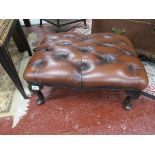 Large leather foot rest on cabriole legs