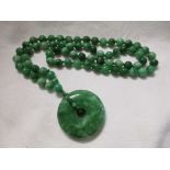 Jade necklace with large dougnut pendant 151grammes