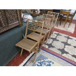 Set of 4 folding teak garden chairs