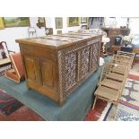 A fine late 16C intricately carved oak coffer with original lock, plate & key