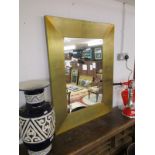 Gilt framed wall mirror