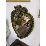 Gilt framed cherub mirror